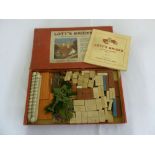 A mid 20th century Lotts bricks in original fitted box to include instructions