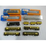 A quantity of HO gauge rolling stock to include Roco, Fleishman, Triang  (12)