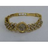 Jaeger le Coultre ladies wristwatch on an 18ct gold and diamond set bracelet, approx total weight