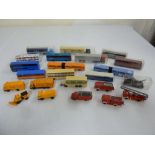 A quantity of plastic model buses, trucks and utility vehicles  (23)