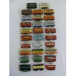 A quantity of N gauge trolley buses and trams motorised, fair to good condition (29)