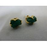 Pair of yellow gold and uncut emerald earrings, tested 9ct