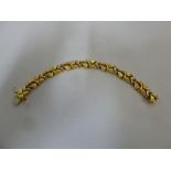 18ct yellow gold fancy link signed bracelet, approx 33.7g