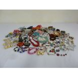 A quantity of costume jewellery to include bracelets, necklaces and earrings