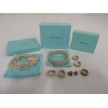 A quantity of boxed Tiffany & Co. Jewellery to include bracelets, earrings and rings  (7)