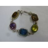 18ct white gold, diamond and coloured stone bracelet