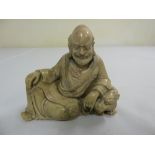 An early 20th century Chinese soapstone carving of Lohan