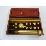 A late 19th century Sykes hydrometer in mahogany fitted case