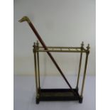 Victorian brass umbrella stand and a walking stick with brass handle