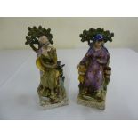 A pair of 19th century Staffordshire figurines depicting Elijah and widow, A/F