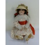 Max Handwerck C297 bisque head doll dressed in contemporary costume