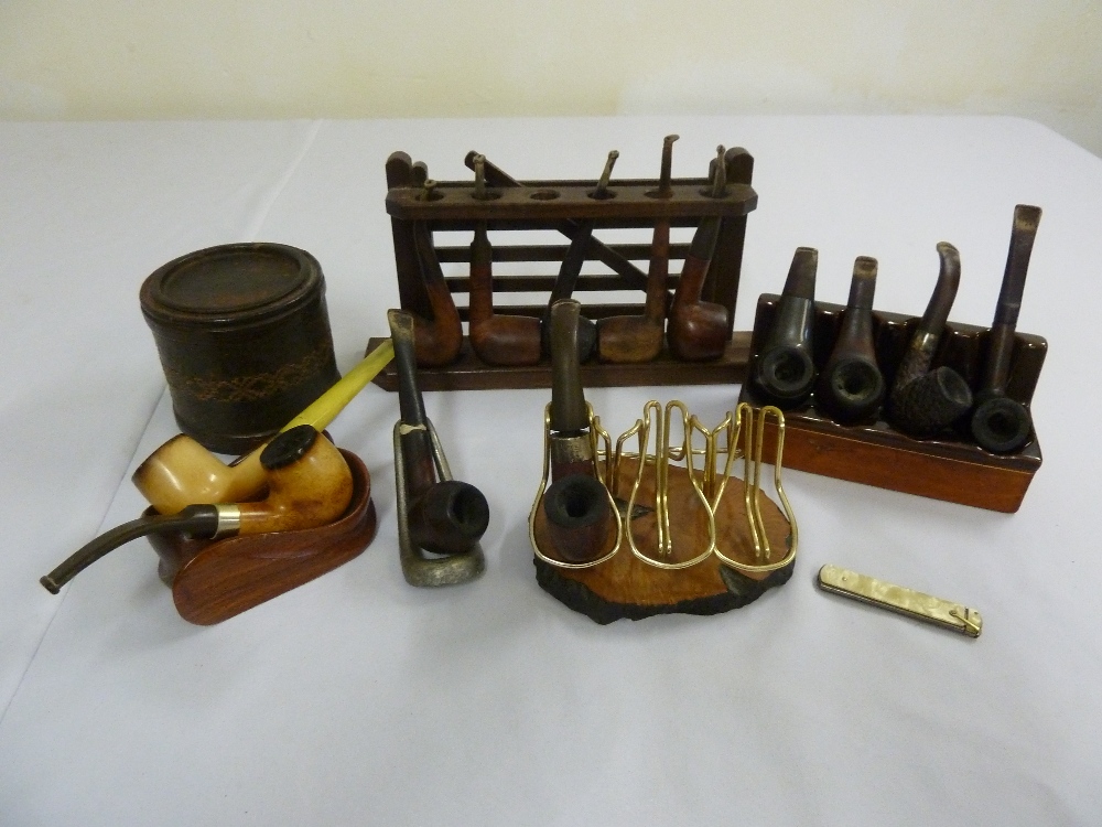 A quantity of pipes, pipe stands and tobacco jars, A/F