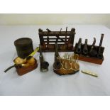A quantity of pipes, pipe stands and tobacco jars, A/F
