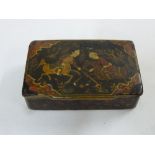 Oriental lacquered box with hinged cover, depicting horsemen playing polo