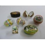 Six porcelain and gilt metal trinket decorative boxes and an oval papier mache box