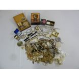 A quantity of costume jewellery to include rings, brooches, pendants, earrings, necklaces and