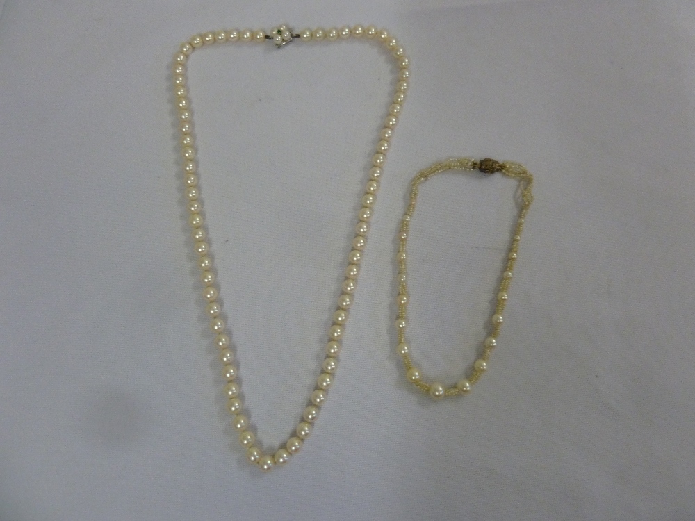 Two pearl necklaces