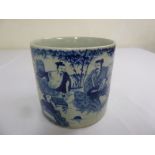 An early 20th century Chinese blue and white cylindrical brush pot