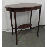 Edwardian mahogany oval side table on four tapering legs