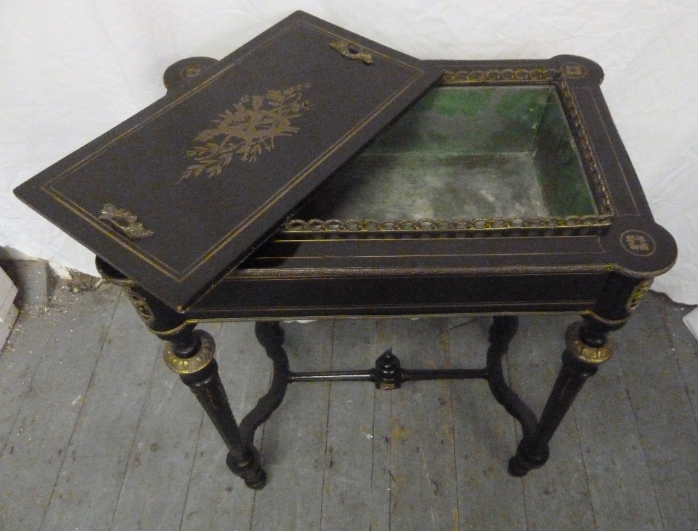 A 19th century French ebonised jardinière in the form of a table with brass inlay, gilt mounts and - Image 2 of 2