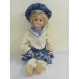 Simon and Halbig 1079 bisque head doll in original clothing