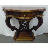 Mahogany hall table with serpentine front on carved wooden feet