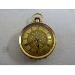 15ct gold ladies pocket watch with engraved back and Roman numeral dial