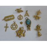 Eleven 9ct gold charms, approx total 17.8g