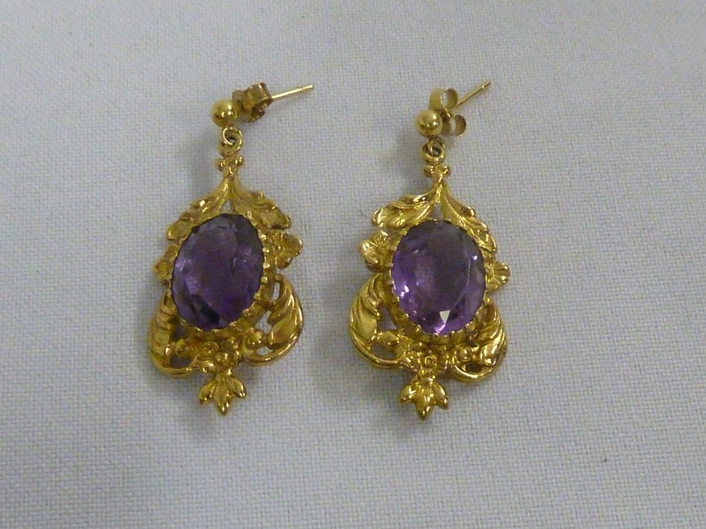 Pair of 9ct gold and amethyst earrings, approx total 8.2g