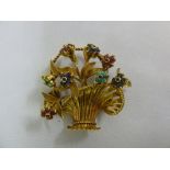 18ct gold en tremblant flower brooch set with coloured stones, approx 15.2g