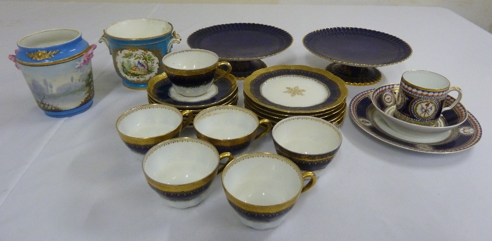 A quantity of French porcelain to include two cache pots, cup, saucer, plate and French part tea set