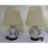 Pair of 20th century porcelain table lamps with shades