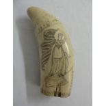 A Scrimshaw style tooth etched with a flag waving female figure