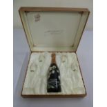 Perrier Jouet a cased set to include a bottle of champagne and four hand painted champagne flutes