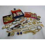 A quantity of costume jewellery and wristwatches to include necklaces, earrings, brooches and