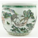 A Chinese porcelain bowl
with design of fallow deer, height 14.75".