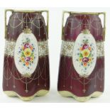 A pair of Japanese 2-handled porcelain vases
with painted floral panels, 12.25".