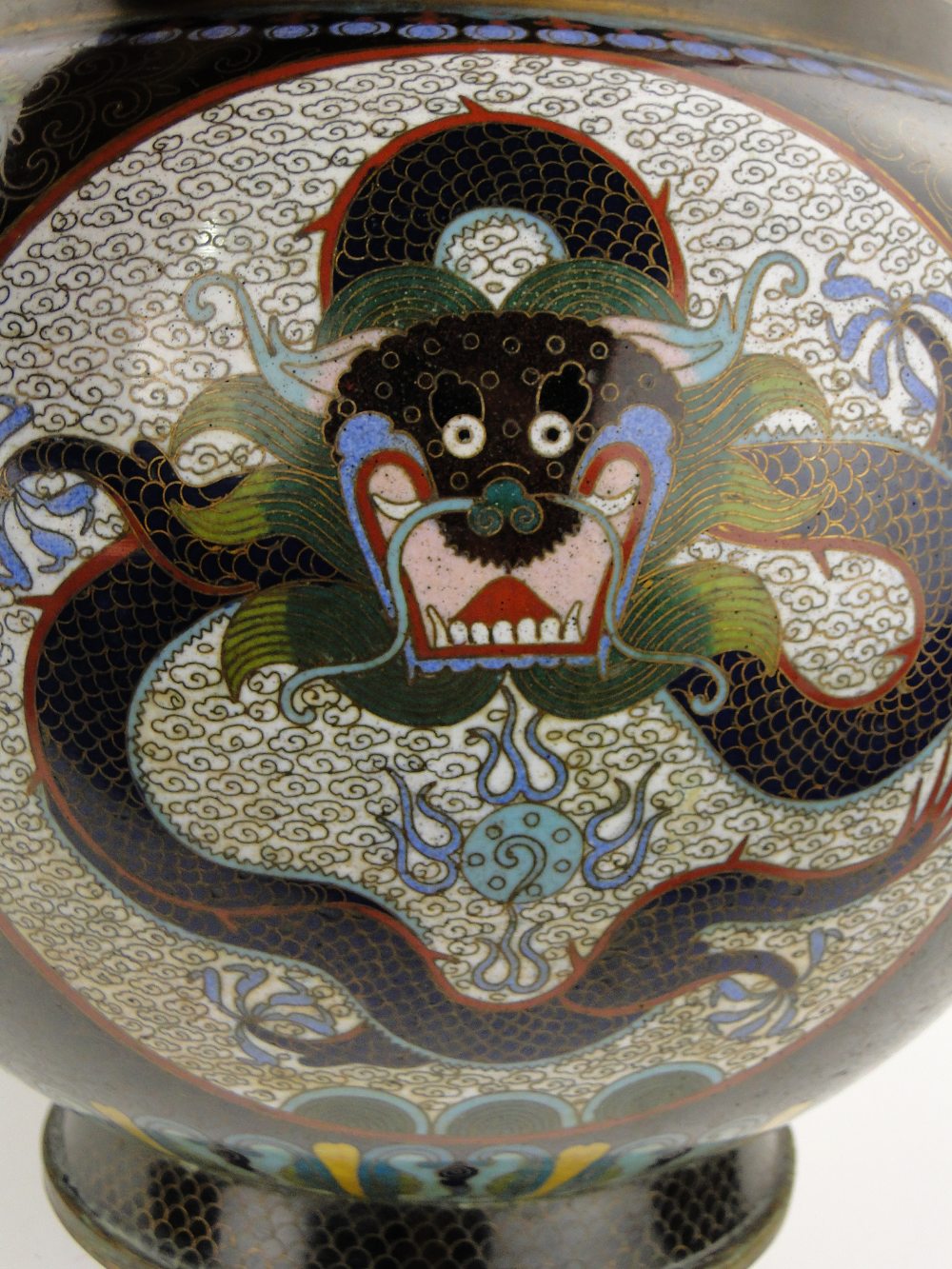 A black ground Cloisonne bowl
with dragon decorated panels, height 9.5", on carved wood stand. - Image 7 of 7