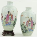 Pair of Chinese porcelain vases
with figures and bats, 8" and 1 stand.