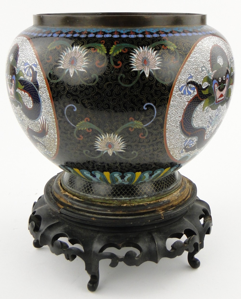 A black ground Cloisonne bowl
with dragon decorated panels, height 9.5", on carved wood stand. - Image 2 of 7