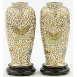 A pair of Satsuma vases
of rounded octagonal form, with butterfly motifs, height 6", with carved