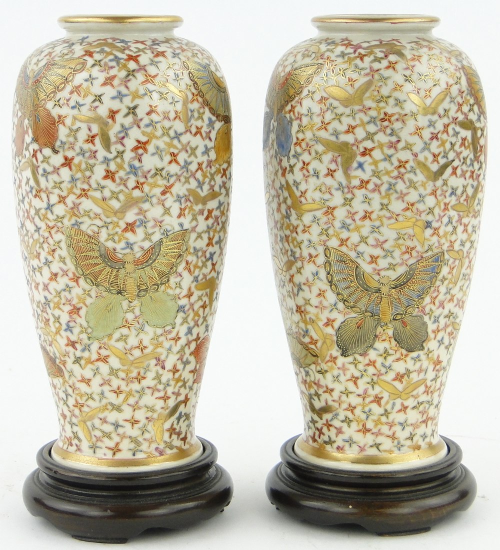 A pair of Satsuma vases
of rounded octagonal form, with butterfly motifs, height 6", with carved - Image 3 of 8