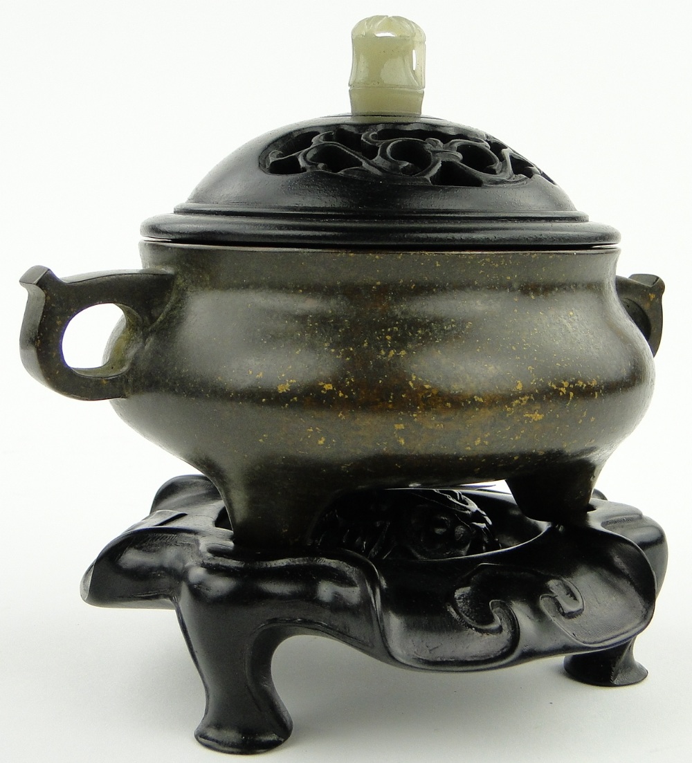 A bronze censer
on 3 feet with 6 character mark, diameter 4.5" with carved wood cover and jade knop - Image 2 of 8