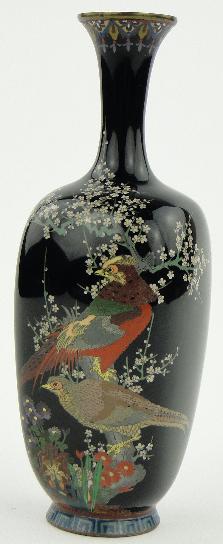 A Chinese blue ground Cloisonne vase
decorated with birds and flowers, 7.25".