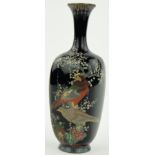 A Chinese blue ground Cloisonne vase
decorated with birds and flowers, 7.25".