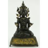 Antique gilded bronze Buddha
with inset stones, 14".