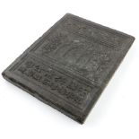 A Chinese pressed tea block
with design of shrine and trees, and script one side and patterned