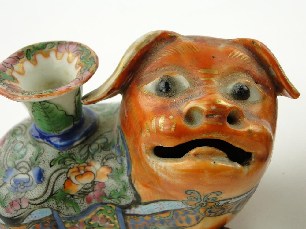 A pair of 19th century Canton enamel lion dog design taper holders,
length 4.75". - Image 7 of 7