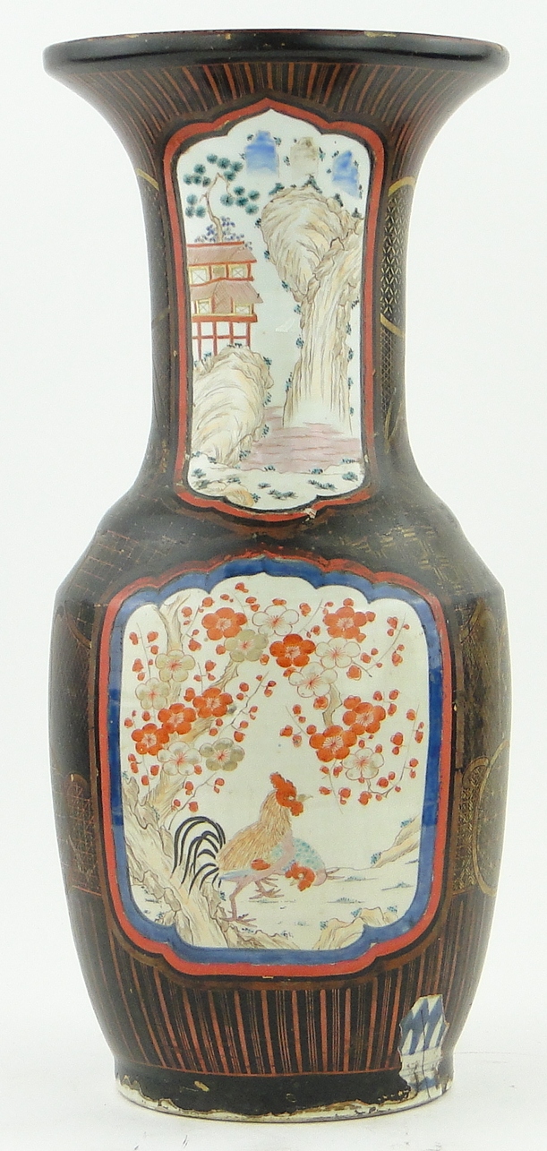 18/19th century Chinese vase
with lacquer and hatch gilded ground covering blue and white