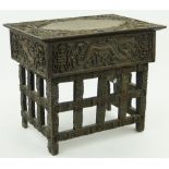 A Chinese carved wood travelling scribes desk,
length 17.5".